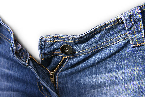 istock View of denim blue jeans with button opened 140474858