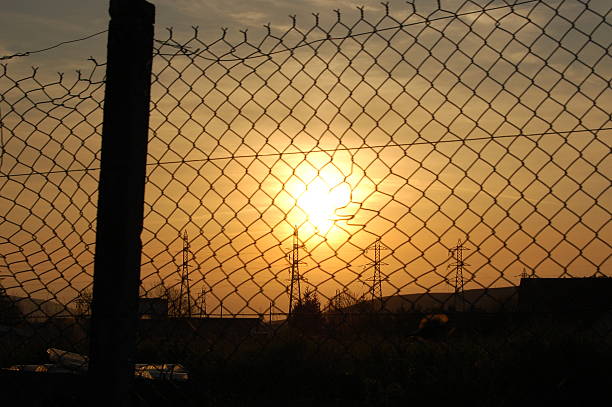 istock Sunset over the fence 140475106