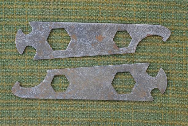 istock old rusty iron bicycle tool lie on a green cloth 1404752533