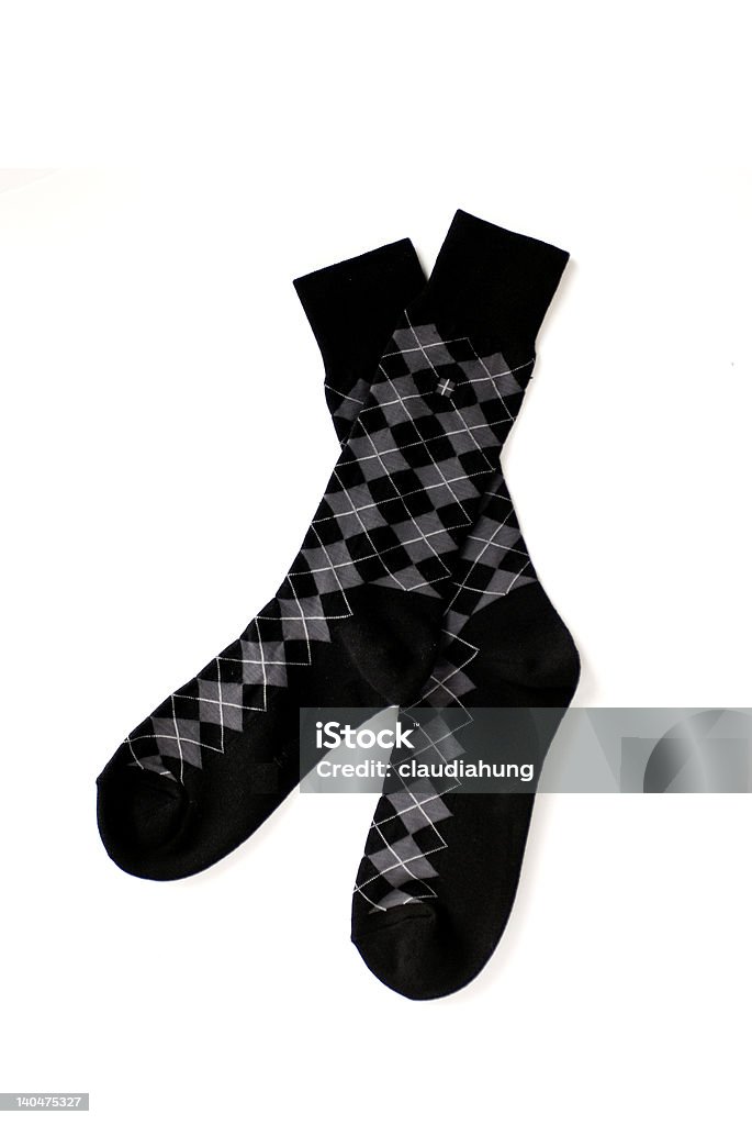 Black and Grey Argyle Sock Black and grey sock with argyle pattern Argyle Stock Photo