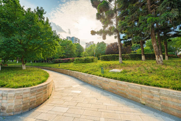 istock Sunny trees, rivers and modern buildings 1404755648