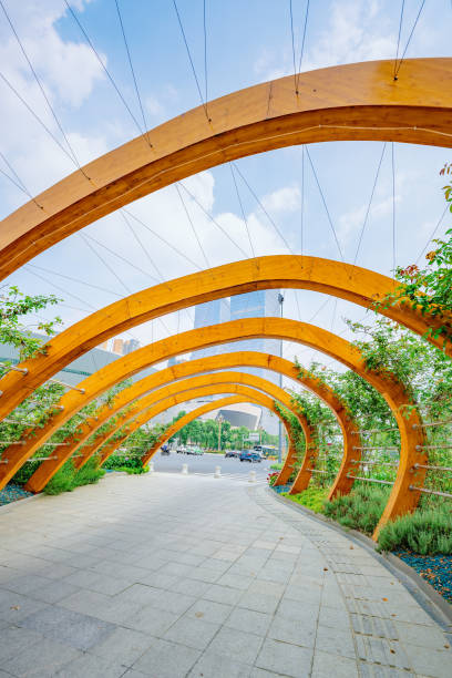 istock Sunny trees, rivers and modern buildings 1404755811