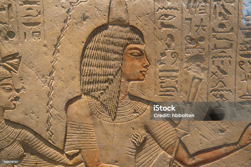 Egyptian queen Egyptian queen cast in Stone with hieroglyphs                                Hieroglyphics Stock Photo