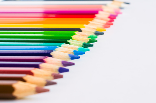 Series of coloured pencils arrangement