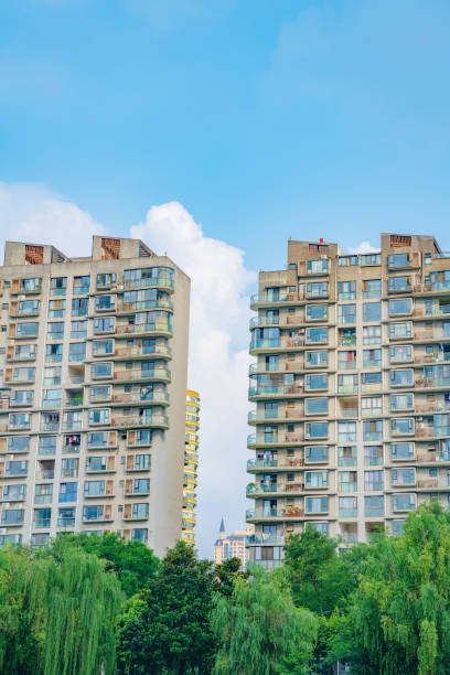 istock Sunny modern residential buildings and trees 1404757729