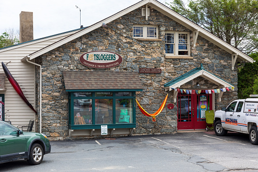 Blowing Rock, NC, USA-20 June 2022: Footsloggers Outdoor and Travel Outfitters, building and sign.