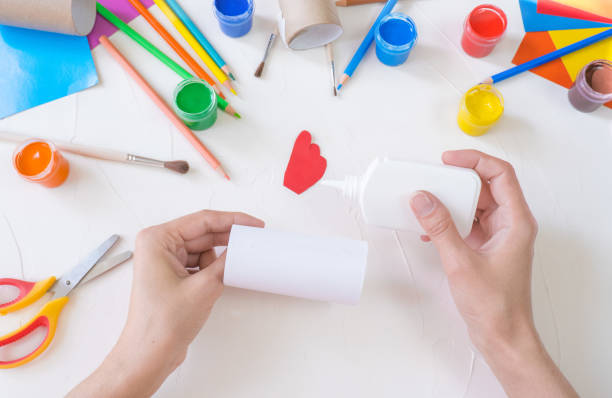 istock step2. The concept of decorating a kindergarten with easter - a chicken, a rooster from a roll of toilet paper. A simple creative idea with your own hands. Eco friendly recycled decor kids paper crafts 1404762712