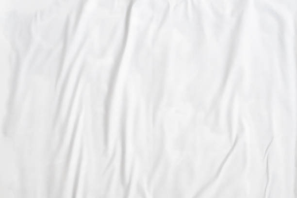 istock white crumpled and creased paper poster texture background 1404762737