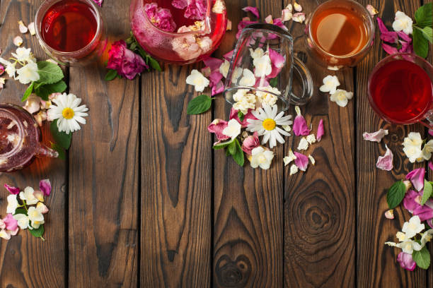 istock various teas with herbs and flowers on a dark wooden table, top view 1404763553