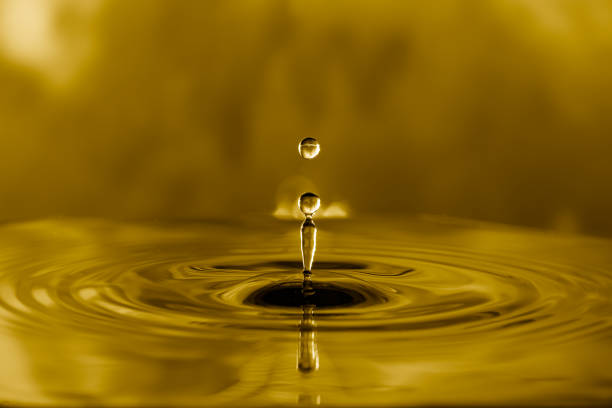 istock Cooking oil drop,ripples with blurred background. 1404766208