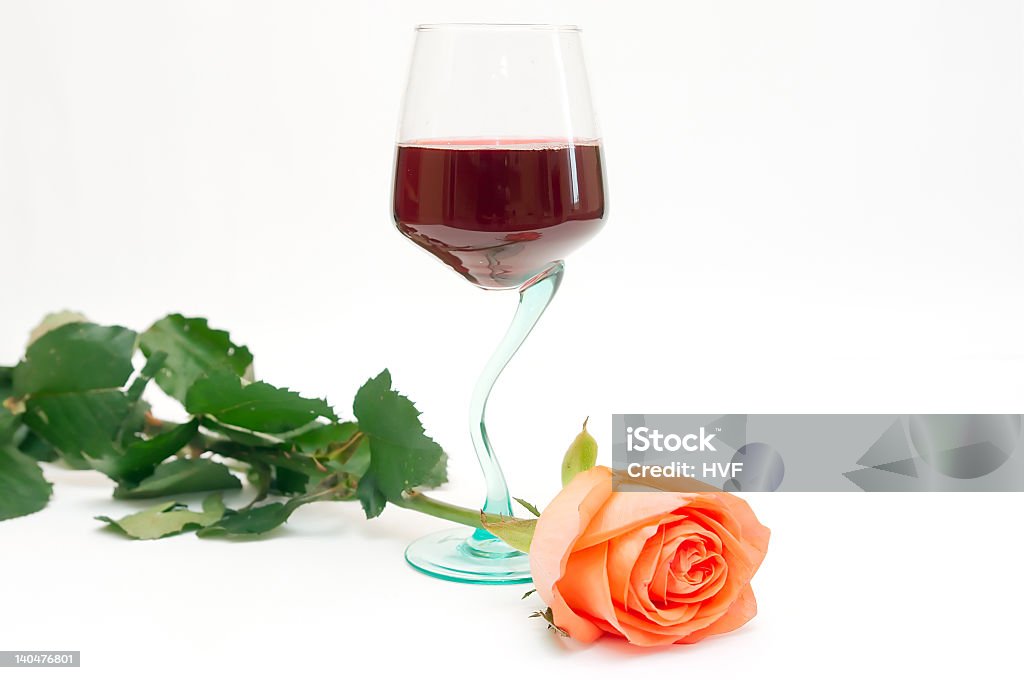 Red wine and rose Red wine in a glass and a rose Alcohol - Drink Stock Photo