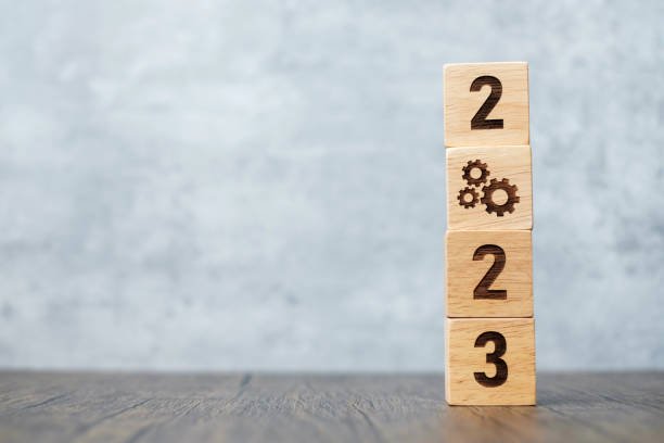 istock 2023 block with gear icon. Business Process, Team, teamwork, Goal, Target, Resolution, strategy, plan, Action, motivation, change, brainstorm and New Year start concepts 1404769879