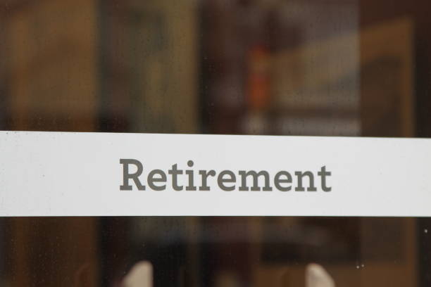 istock Sign On A Building With The Word -Retirement 1404769921