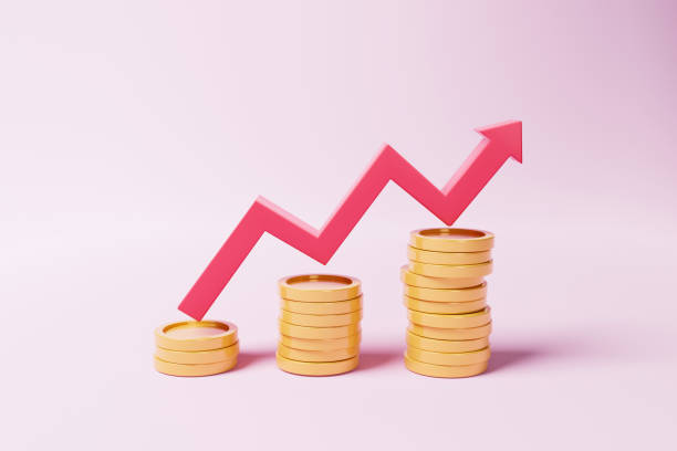 Red up arrow and coin stacks on pink background. Financial success and growth concept. 3d illustration stock photo