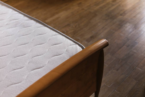 istock mattress on the bed close-up 1404772374