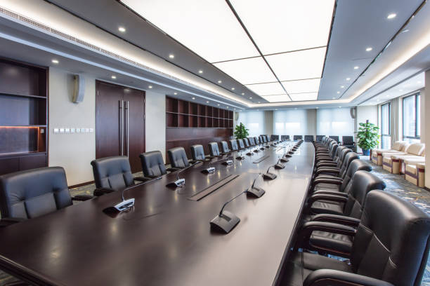istock Board meeting is ready, luxury meeting room is empty 1404775231