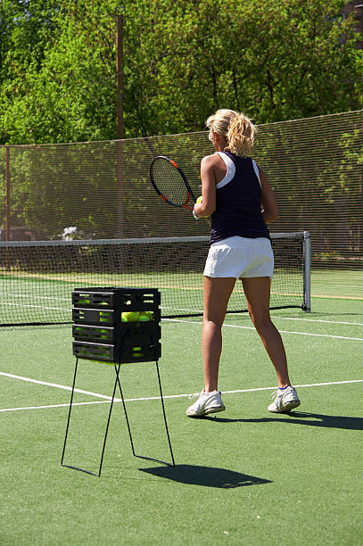 Fille jouant au tennis - Photo