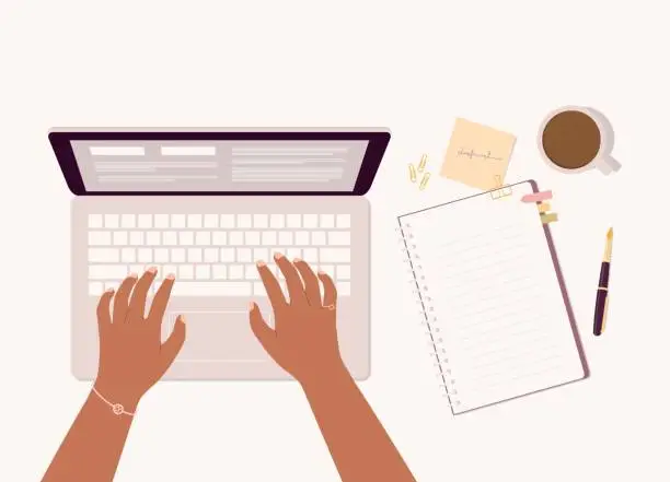 Vector illustration of Black Female’s Hand Typing On Laptop Keyboard With Stationary Items And Coffee Laying On Table Top.