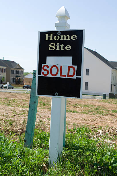istock Empty Lot with "Sold" sign 140478192
