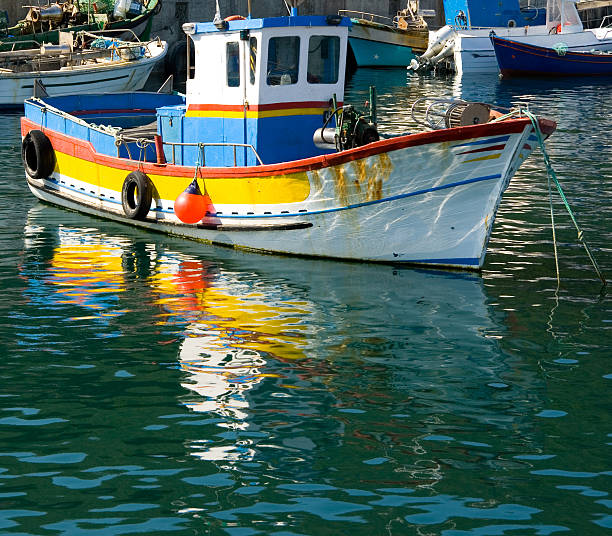 Colorful fishing boat stock photo