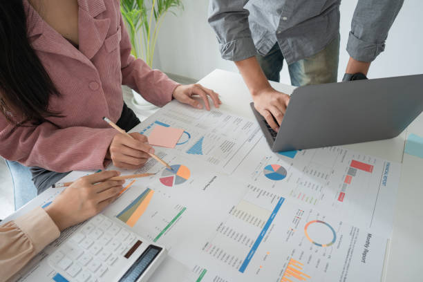 istock Young business team working with business report document on office desk. Brainstorming Business People Design Planning, Brainstorming Planning Partnership. 1404783032
