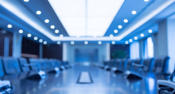 istock Defocused blurred Empty Meeting Room with Big Conference Table 1404783164
