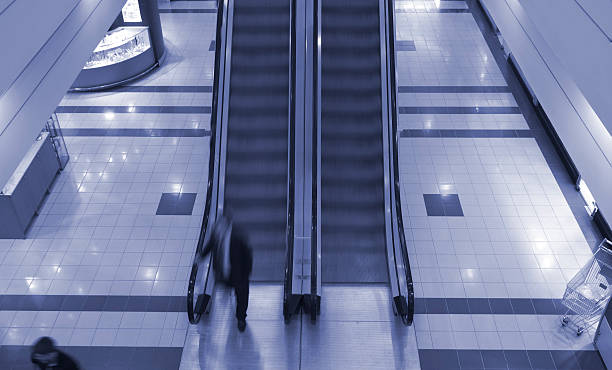 istock Escalator in shopping center 140478375