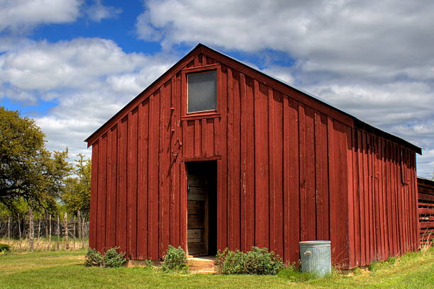 istock red barn in the Texas Hill country 140478447