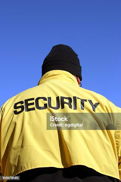 Agente De Segurança - Fotografias de stock e mais imagens de Adulto - Adulto, Agente de segurança, Amarelo