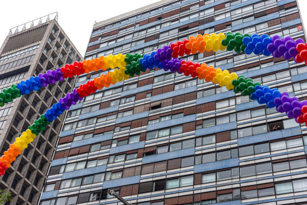 balloon LGBTQI colorful gay pride bladder balloon in multi colored outdoor color colors doa rainbow sao paulo gay pride parade stock pictures, royalty-free photos & images