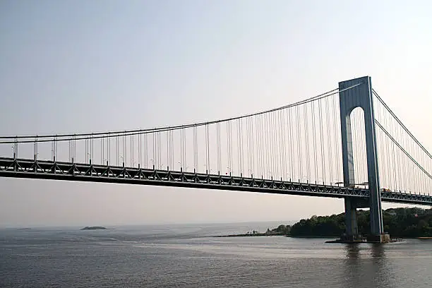 Verrazano Narrows Bridge shot from underneath which connects Brooklyn, NY with Staten Island NY (suspension bridge)