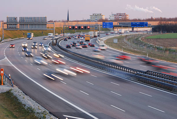rush hour at munich, motion blur, twilight rush hour at munich, motion blur, twilight. Multiple lane highway, German Autobahn autobahn stock pictures, royalty-free photos & images