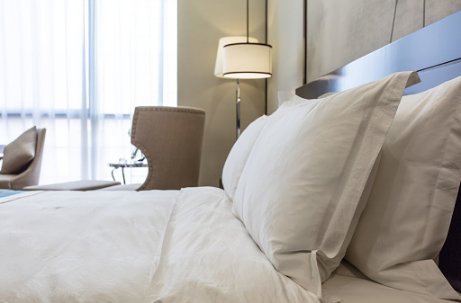 Modern bedroom with white bed