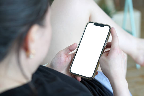 istock mockup screen phone in woman hand 1404789046
