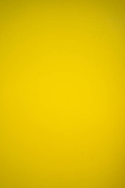 istock The texture of the wall is smooth, yellow or gold. 1404792604