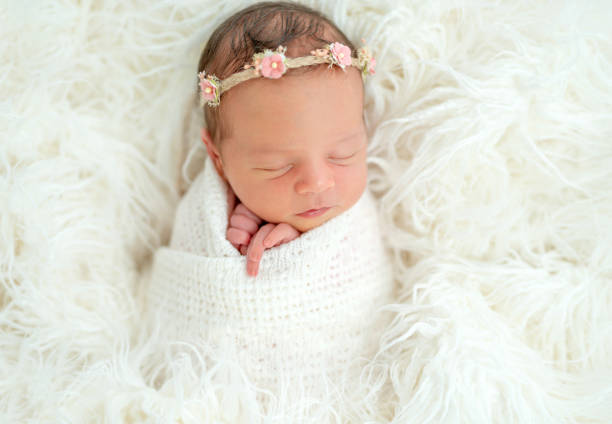 istock newborn baby sleeping in the basket 1404795900