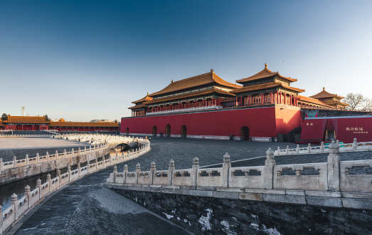 Entrance to the forbidden city in Beijing, China. Lot's of tourists meeting in front of the temple.