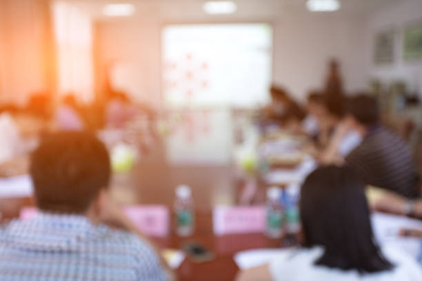 Asian businessmen having a business meeting, defocused effect