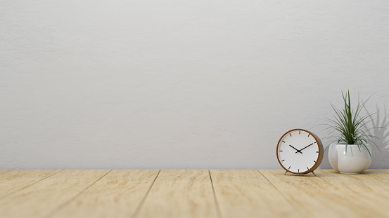 Minimal wooden tabletop with clock, decor plant and copy space for montage your product display over white wall. Workspace or Tabletop concept, closeup image, 3d rendering, 3d illustration