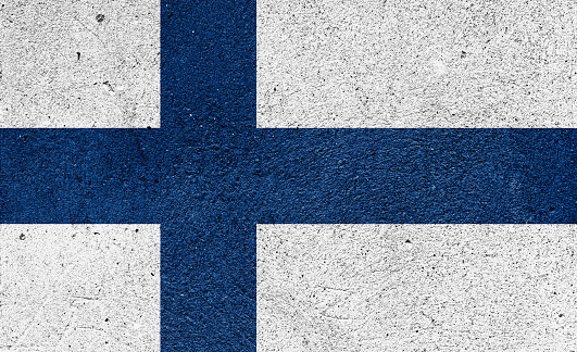 National flag of Finland on a plastered wall