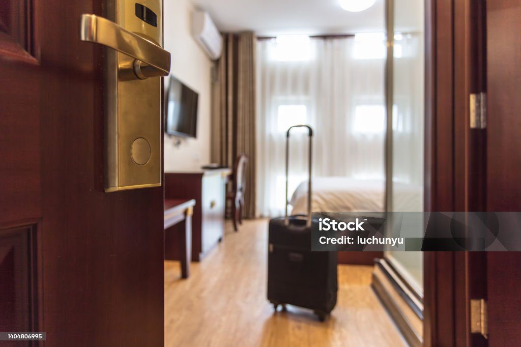 Suitcase delivered standing in hotel room. concept of Hotel service and travel Hotel Stock Photo