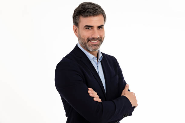istock Businessman smiling with arms crossed on white background 1404807618