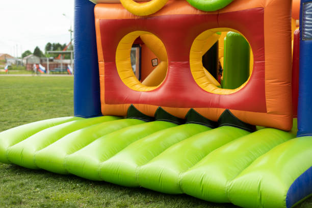 istock Inflatable construction in amusement park. Obstacle course for children. 1404808300