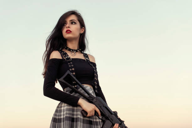 Girl with a gun in her hands