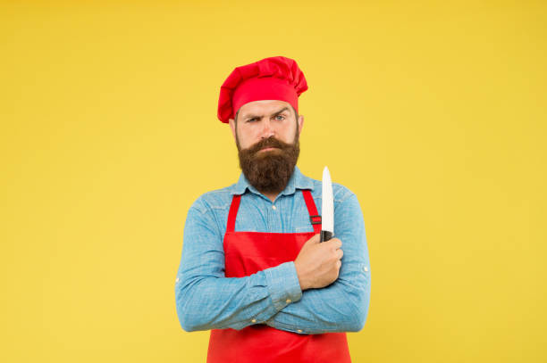 istock Chef using ceramic knife for cutting fruits and vegetables 1404808743