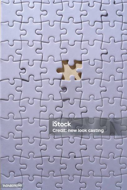 Finishing The Blank Puzzle Game Stock Photo - Download Image Now - Finishing, Abstract, Backgrounds