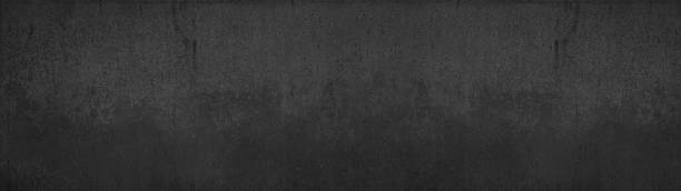 istock Black anthracite abstract stone concrete texture background pattern panorama banner long 1404810813