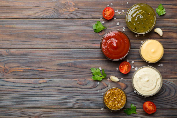 istock Many different sauces and herbs on table, flat lay top view. sauces with spices healthy concept 1404814676