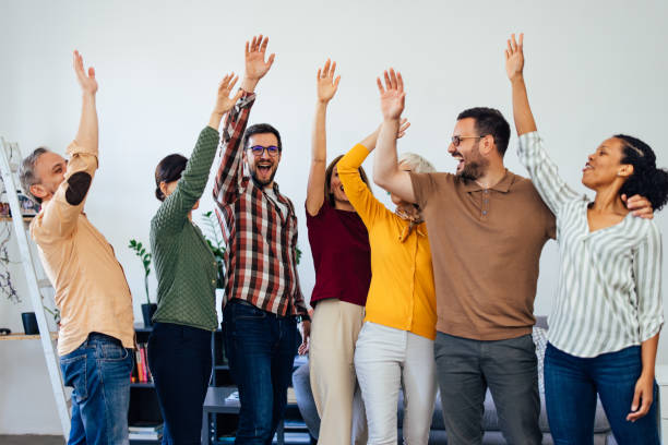 istock Positive people cheered themselves and finished group therapy. 1404822303