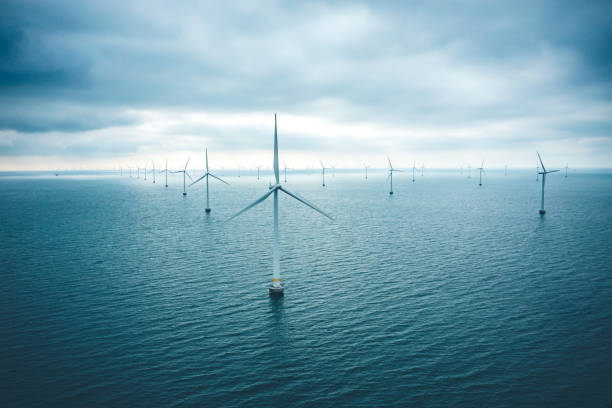 istock Wind turbines at sea 1404822413